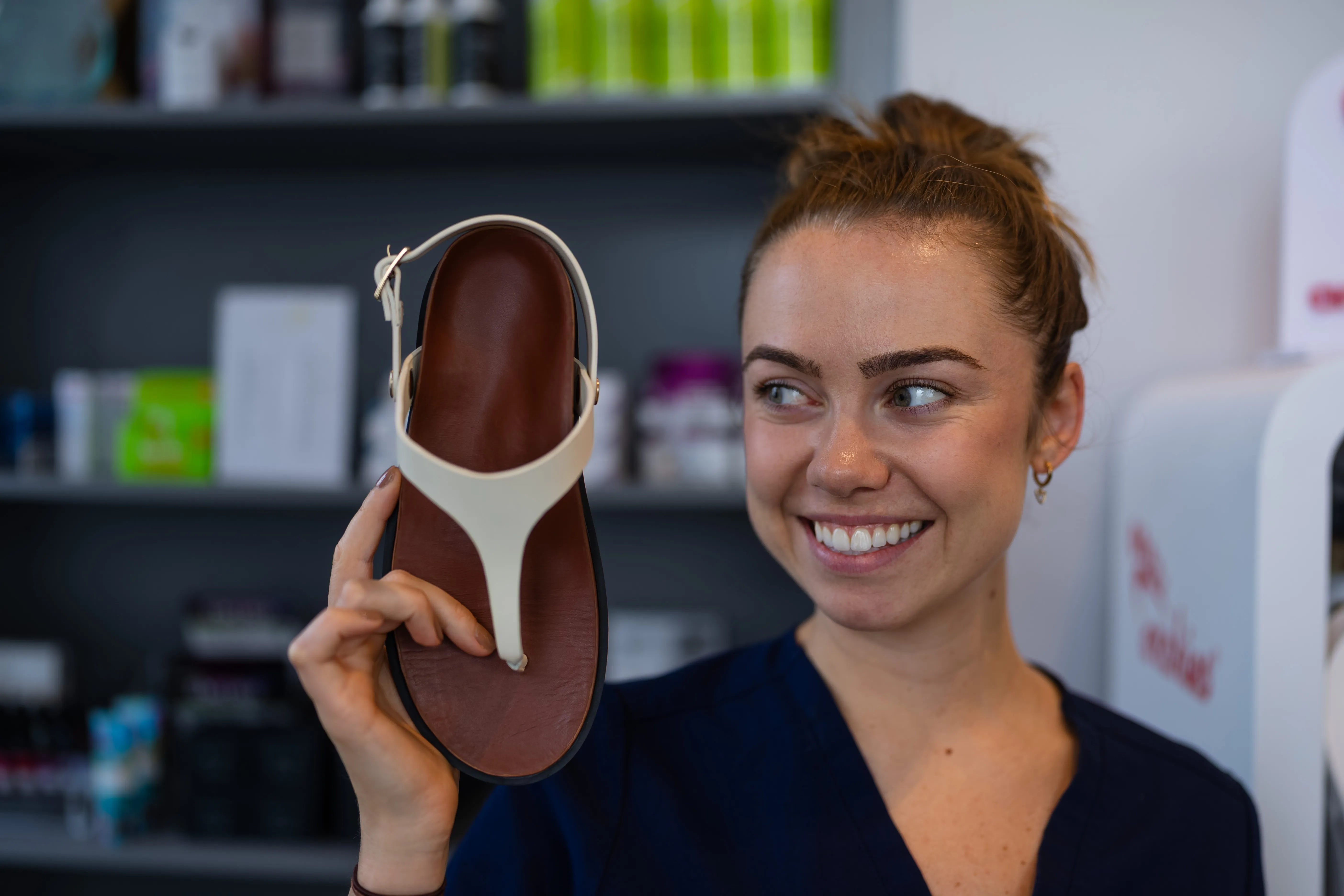 Custom orthotic insoles made at Flawless Feet to support the arch in PTTD